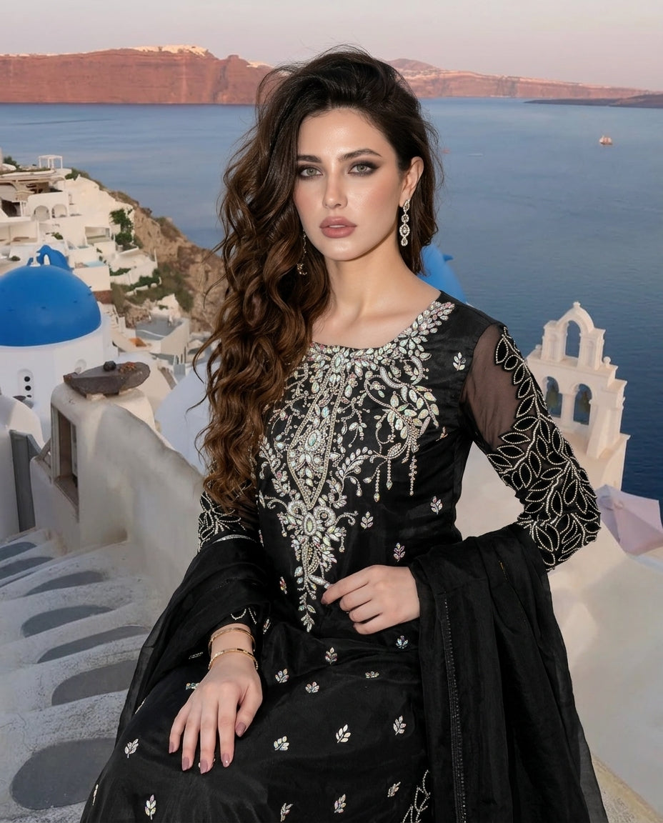 Glimmer Black Dress - Close Up Portrait with Santorini Blue Domes Background | Armia Official